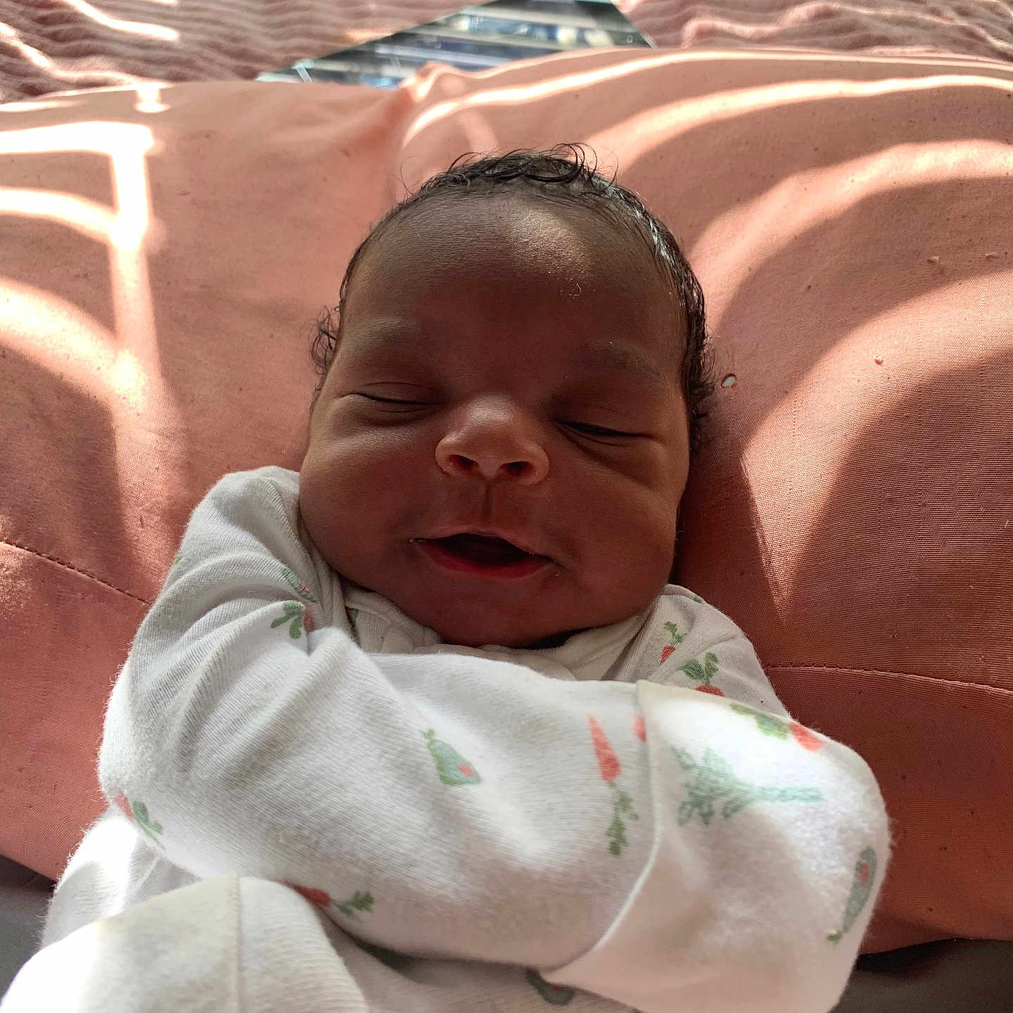 Miyir is registered to the contest to win money with this photo: baby, baby_clothes, child, closeup, cozy, cute, face, human, indoors, infant, natural_light, newborn, onesie, peaceful, pink_blanket, portrait, resting, sleeping, soft_texture, white_clothing