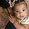 Brittany joined the competition — help win amazing prizes! toddler, child, baby, hair_bows, curly_hair, tattoo, adult, hand, close_up, portrait, indoor, cute, expression, clothing, person, skin, face, holding, black_top, intimate