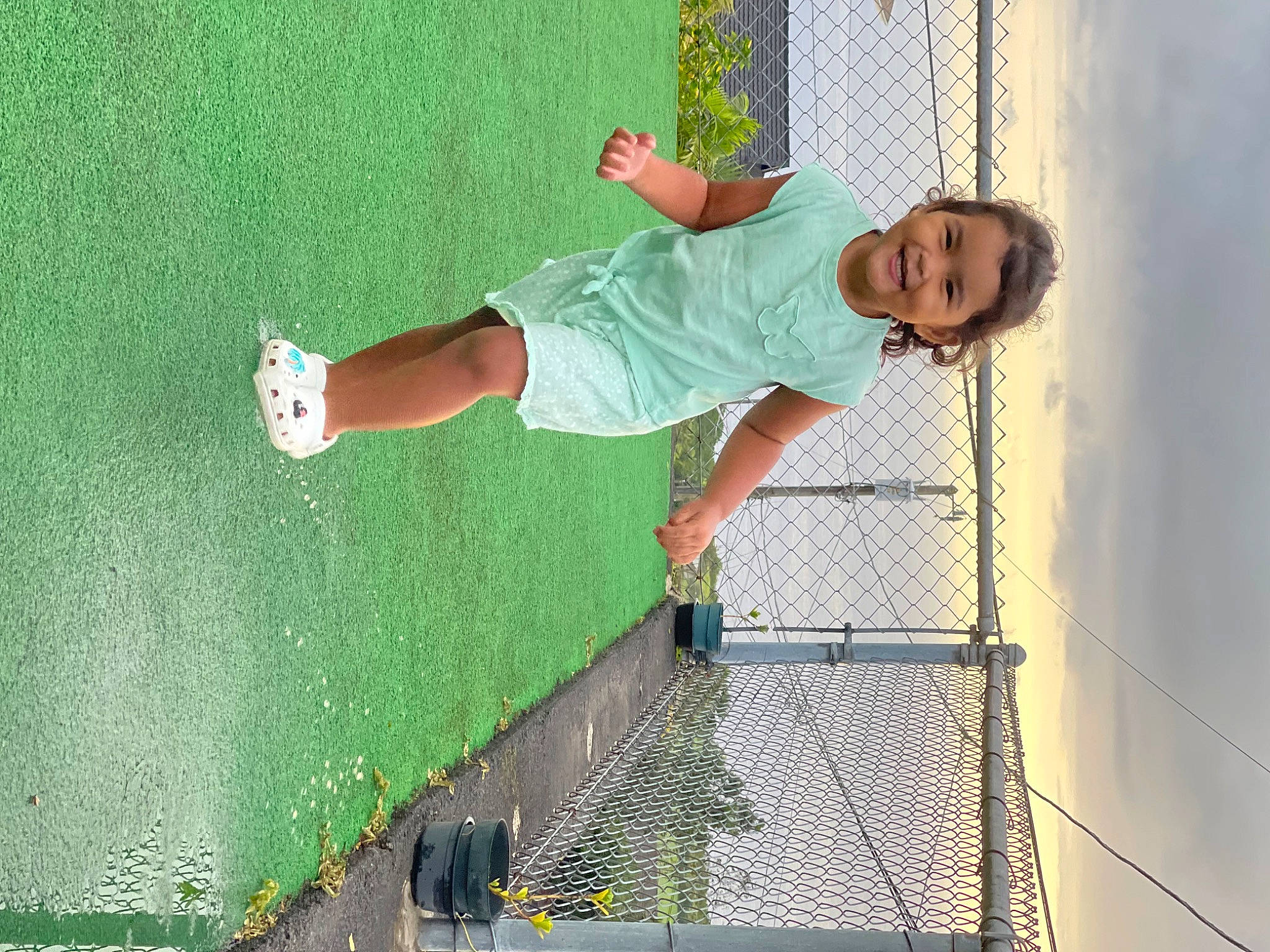 Aiko joined the competition — help win amazing prizes! cloud, fun, grass, green, happy, human_leg, joy, knee, leisure, mesh, net, people_in_nature, person, play, recreation, shorts, sky, smile, sports, sports_equipment
