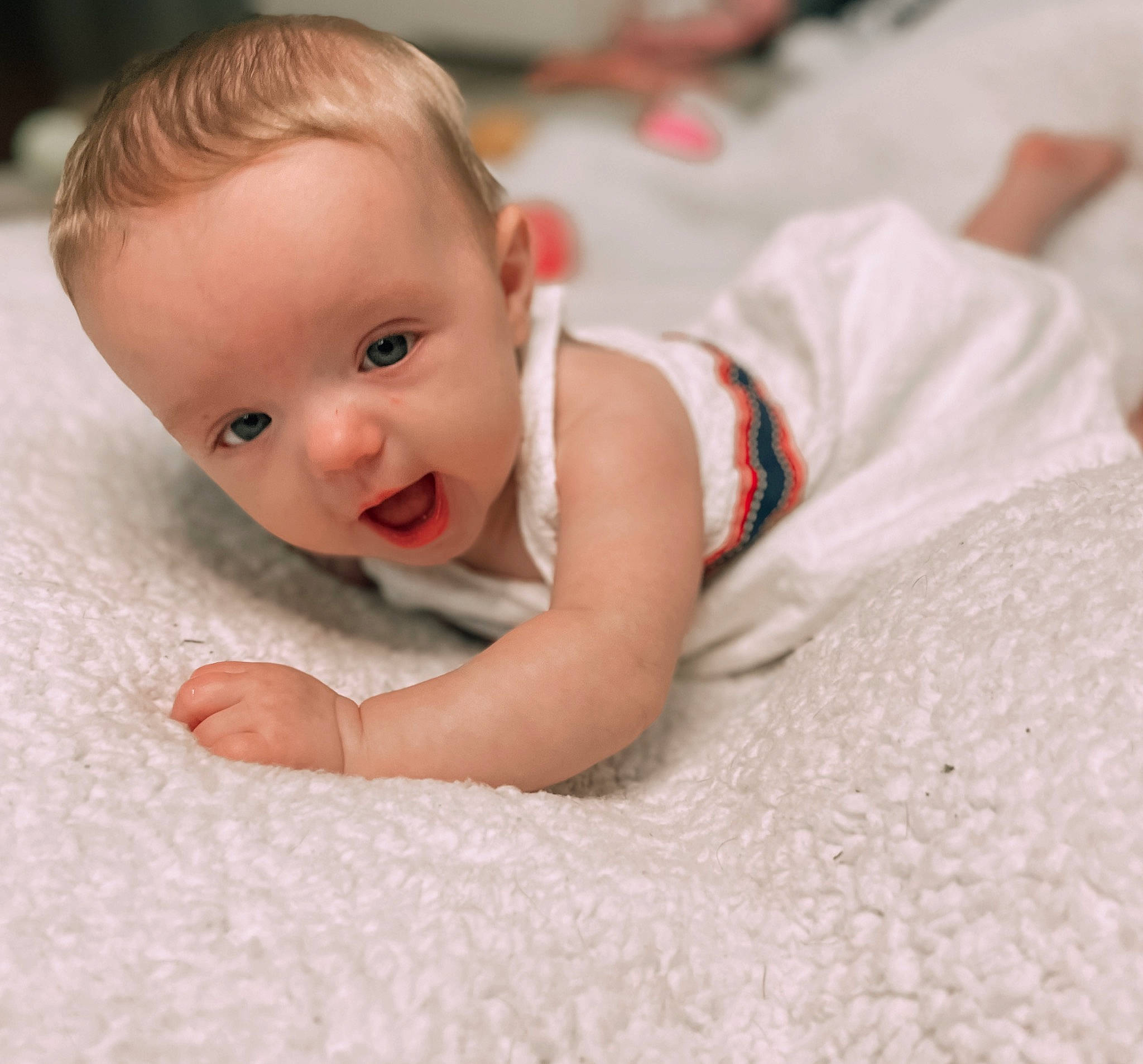 Madison joined the competition — help win amazing prizes! arm, baby, baby_crawling, baby_toddler_clothing, cheek, collar, comfort, crawling, eye, floor, flooring, fun, happy, linens, person, sitting, skin, sleeve, toddler, tummy_time