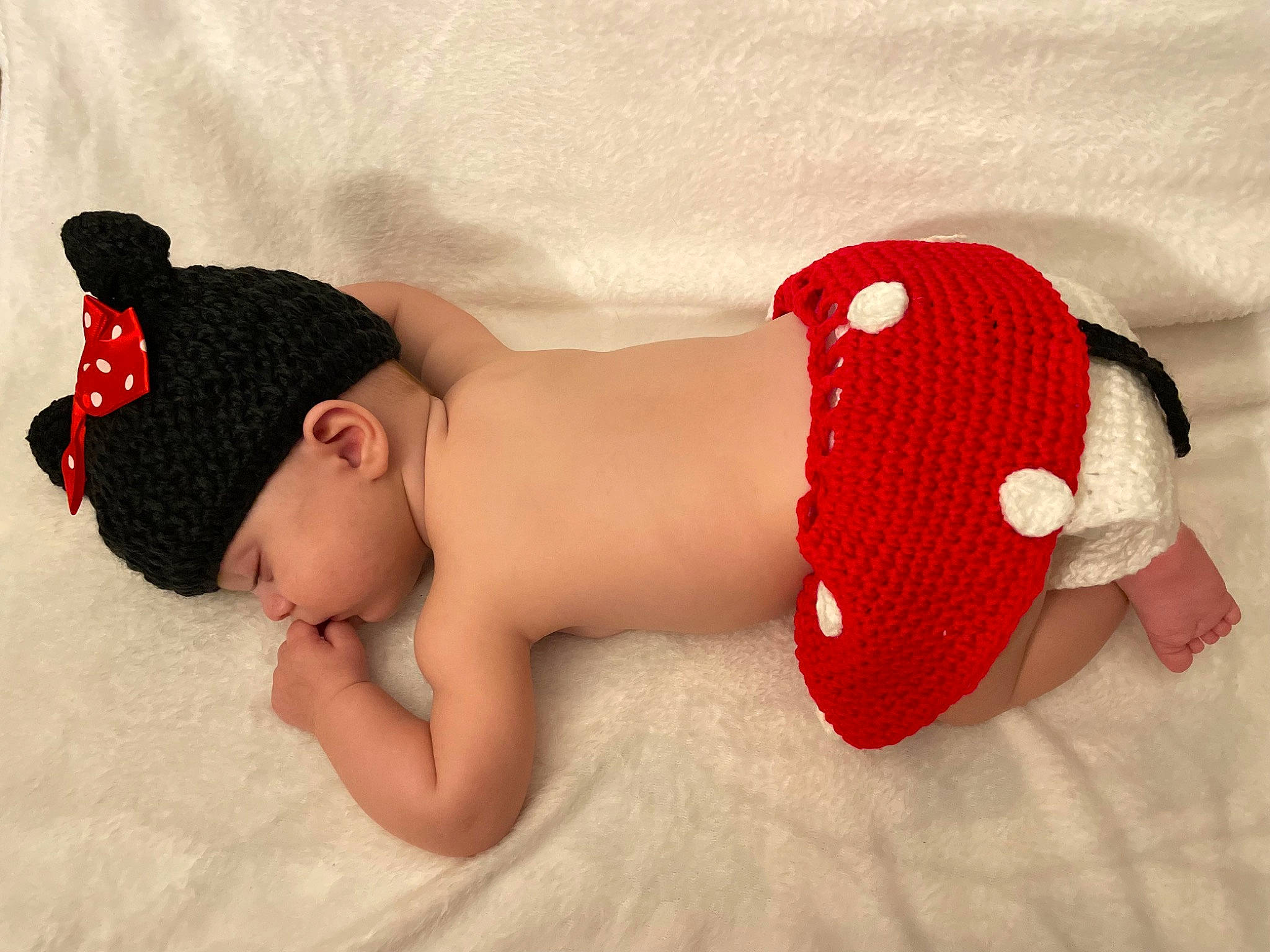 Heather joined the competition — help win amazing prizes! abdomen, arm, baby, baby_sleeping, baby_toddler_clothing, cap, comfort, finger, hand, headgear, headwear, human_body, human_leg, leg, pattern, person, stomach, textile, thigh, toddler