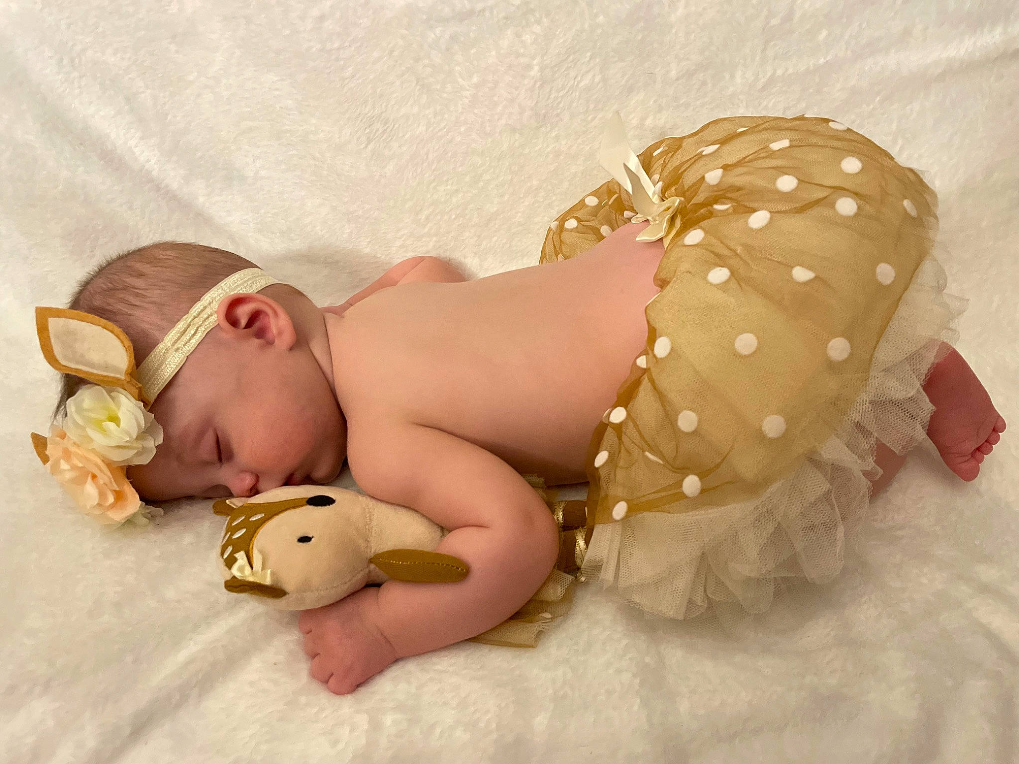 Heather is registered to the contest to win money with this photo: baby, baby_products, baby_sleeping, baby_toddler_clothing, child, comfort, doll, eye, fashion_accessory, fawn, hat, headband, headgear, headpiece, jewellery, linens, person, personal_protective_equipment, skin, toy