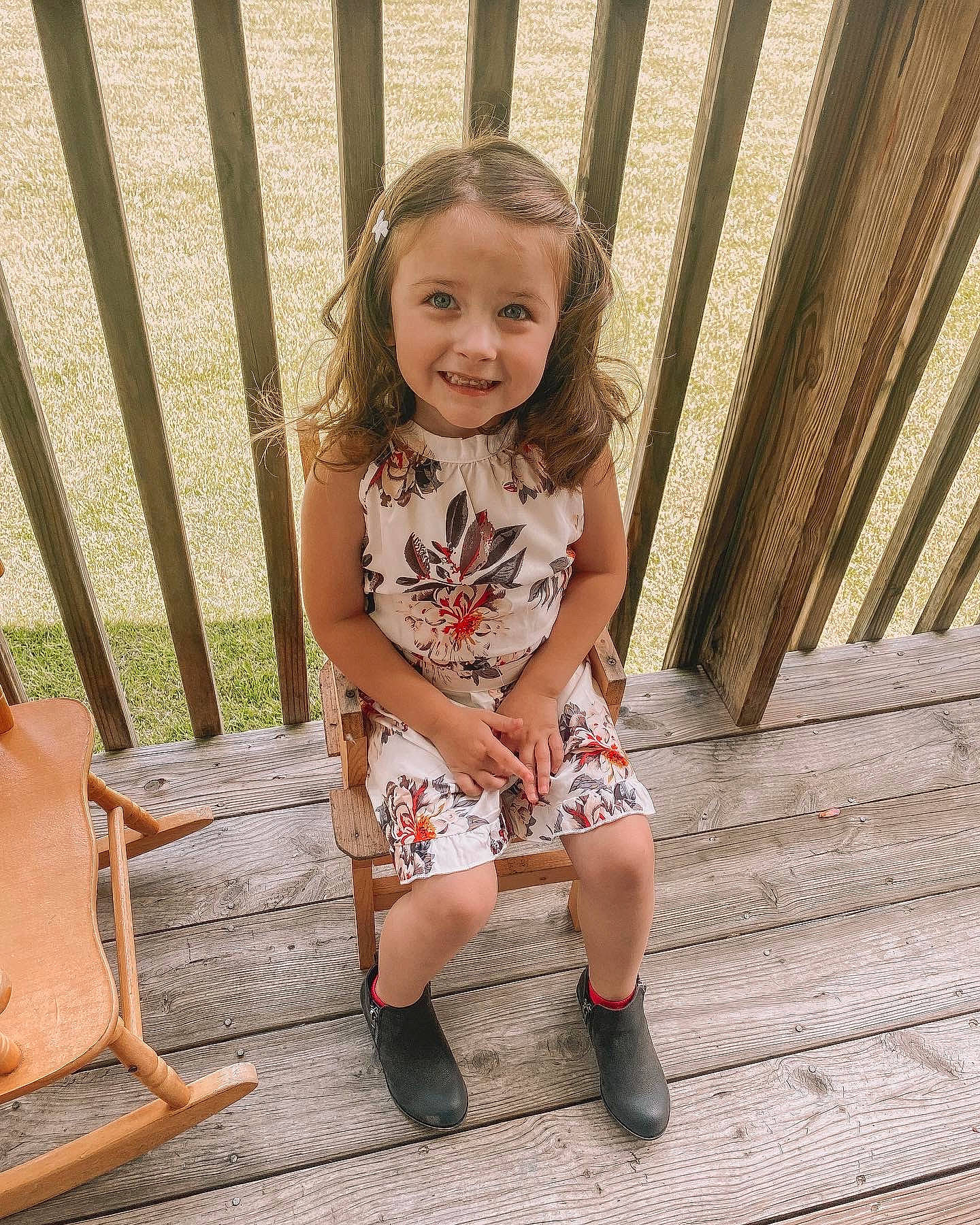 Koda joined the competition — help win amazing prizes! baby_toddler_clothing, dress, eye, face, fawn, fence, footwear, grass, hair, hairstyle, happy, head, iris, joy, organ, person, skin, sleeve, smile, street_fashion