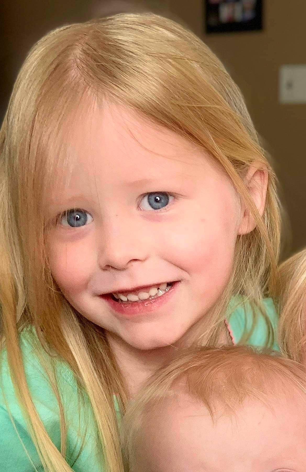 Addi is registered to the contest to win money with this photo: cheek, child, chin, ear, eye, eyebrow, eyelash, face, happy, iris, jaw, joy, layered_hair, lip, long_hair, nose, person, pink, skin, smile