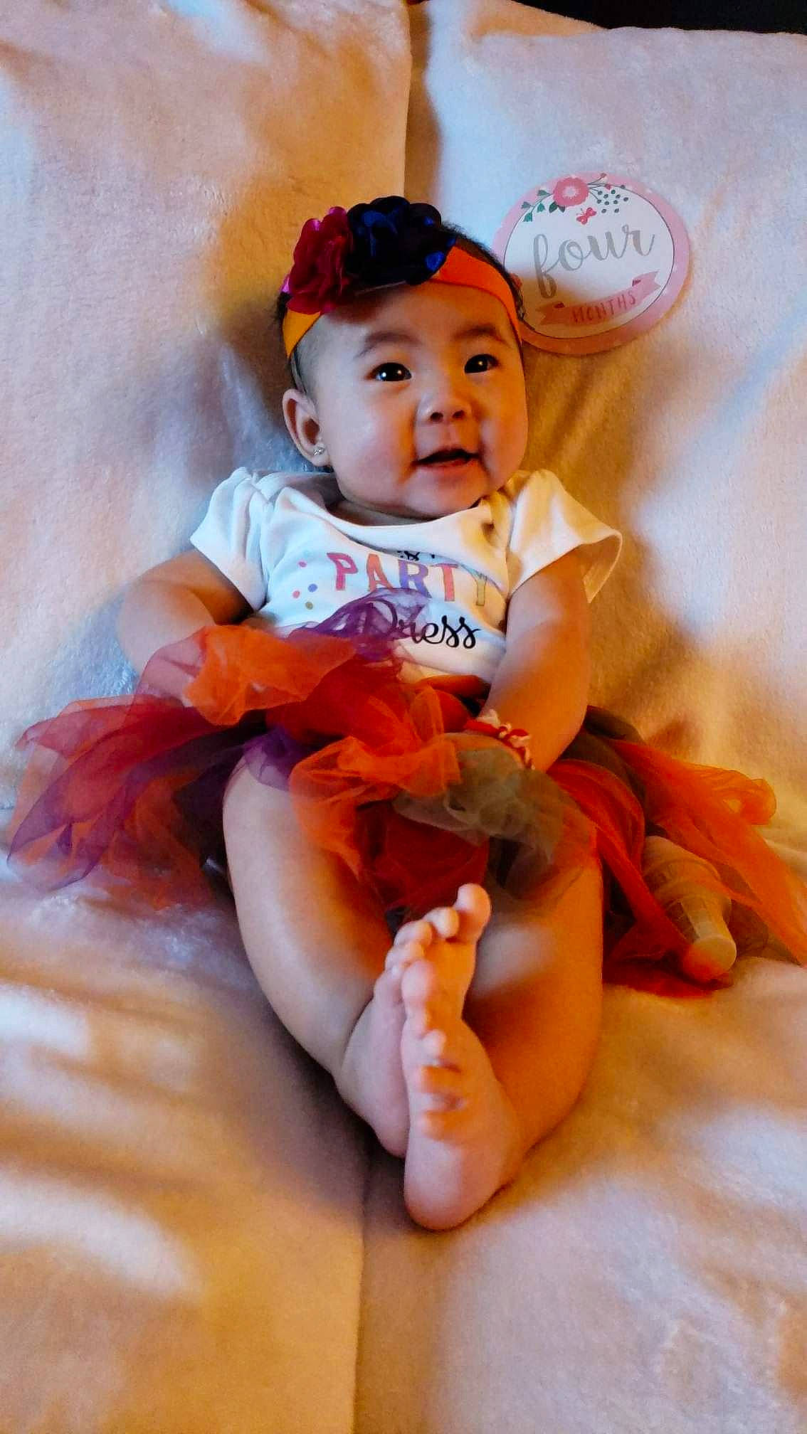 Cherish is registered to the contest to win money with this photo: baby, child, orange, person, toddler