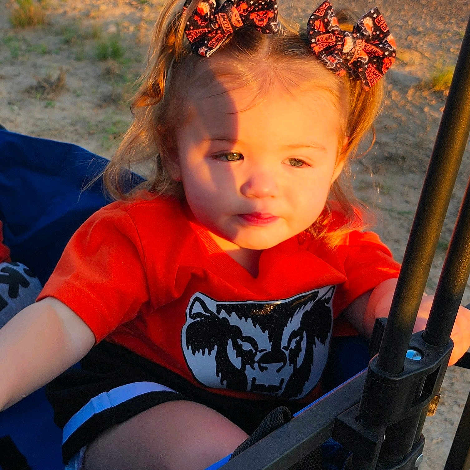 Paris is registered to the contest to win money with this photo: accessories, child, clothing, face, female, furniture, girl, grass, head, nature, outdoorplayarea, outdoors, person, photography, plant, playarea, portrait, summer, t_shirt, toy