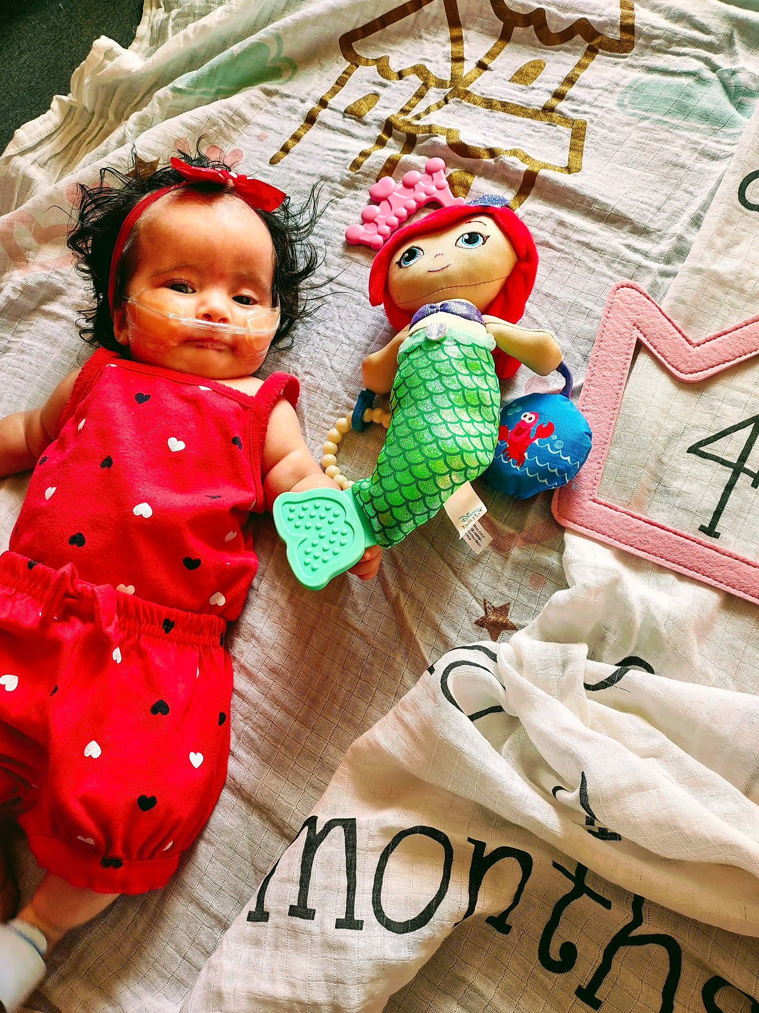 Lunabelle is registered to the contest to win money with this photo: art, baby, baby_products, baby_toddler_clothing, child, comfort, doll, dress, happy, linens, pattern, person, photograph, pink, room, sleeve, stuffed_toy, textile, toddler, toy