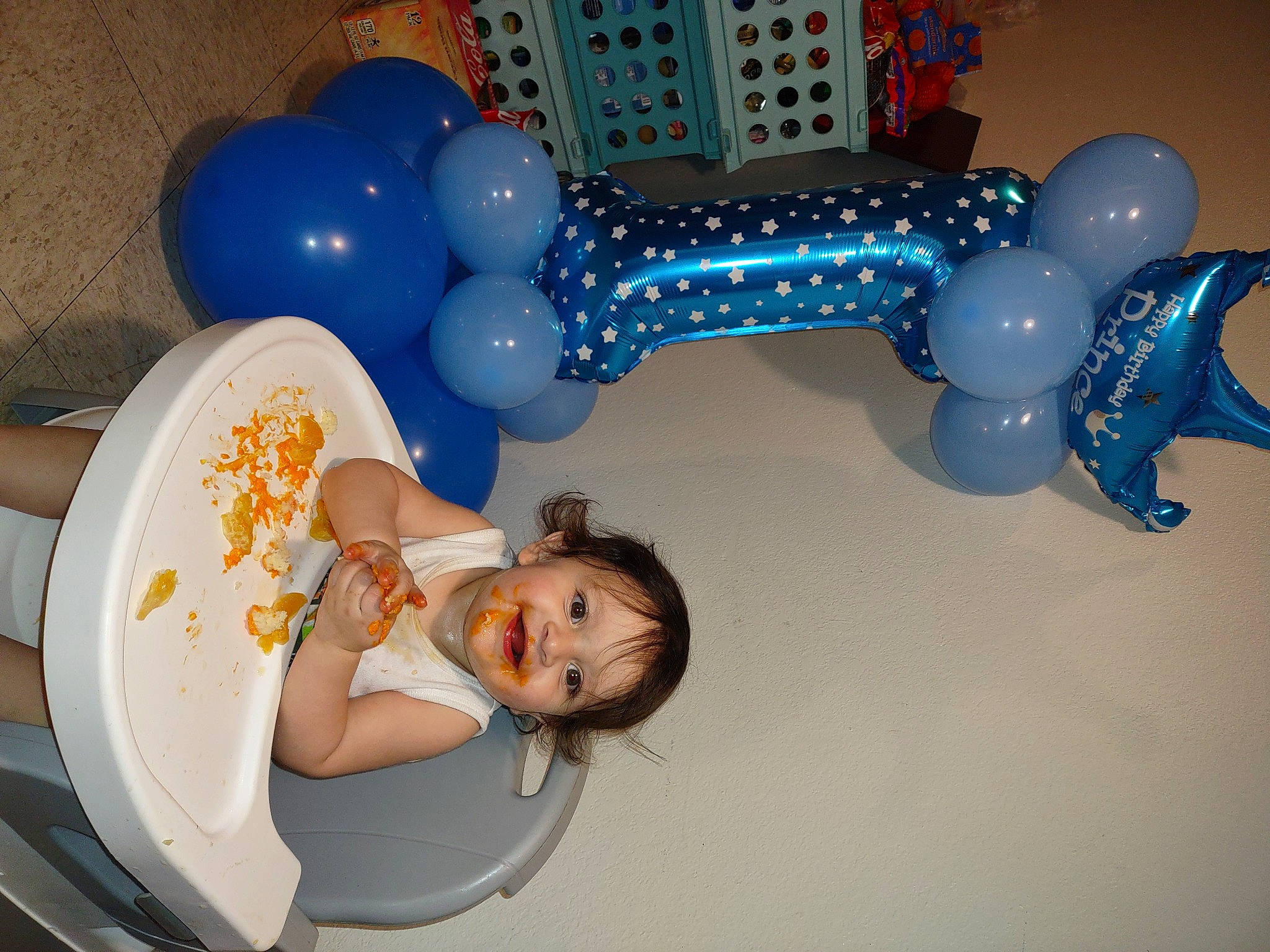 Monroe is registered to the contest to win money with this photo: arch, balloon, blue, child, circle, comfort, electric_blue, event, fun, gesture, happy, joy, leisure, organ, party, party_supply, pattern, person, room, sitting