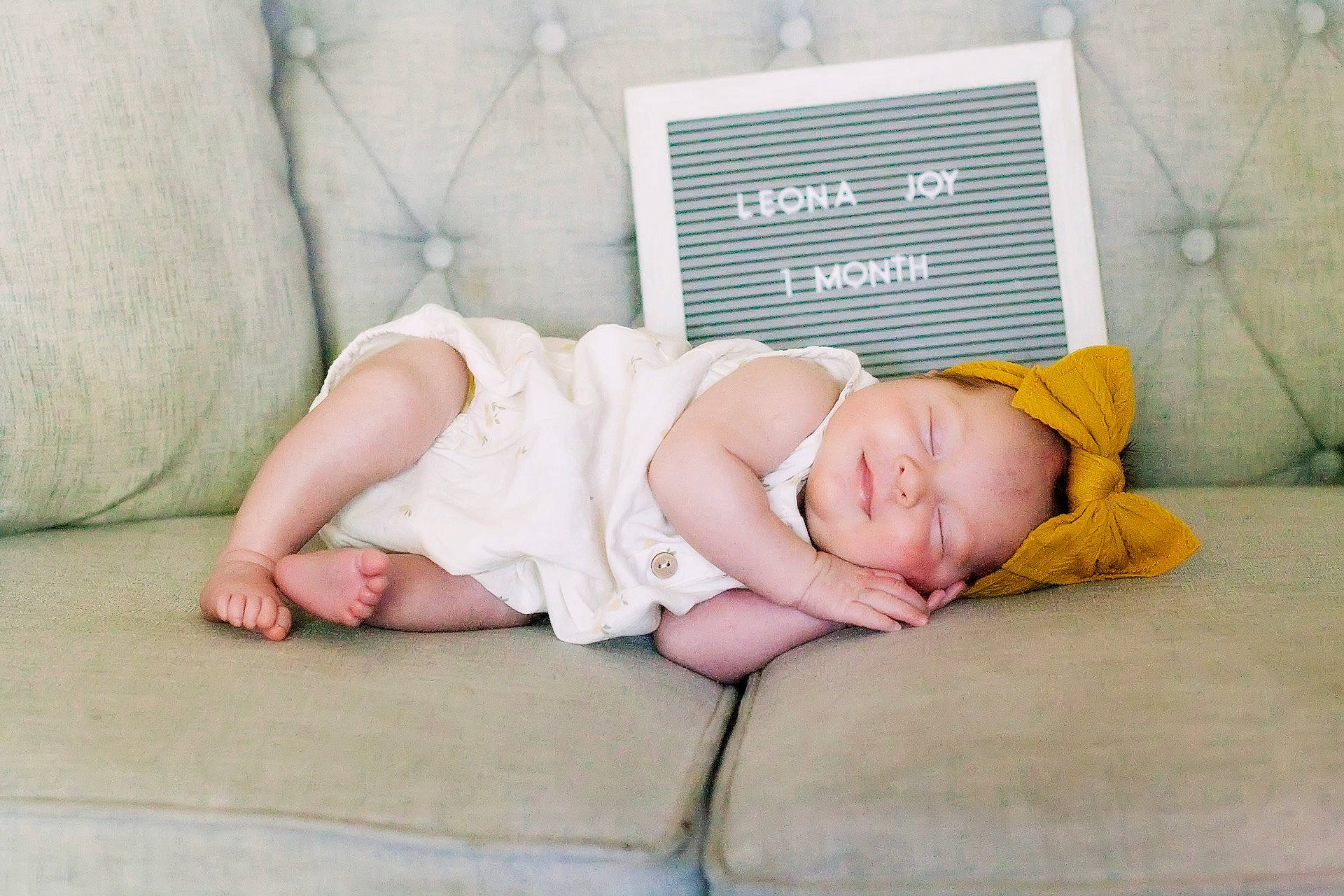 Leona joined the competition — help win amazing prizes! baby, baby_toddler_clothing, bedtime, child, comfort, fashion_accessory, flash_photography, flooring, foot, grass, hand, hat, linens, nap, pattern, person, portrait_photography, room, sitting, toddler
