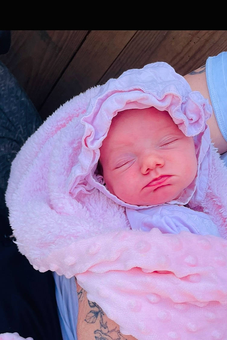 Dalia participe au concours pour gagner de l'argent avec cette photo : baby, baby_products, baby_sleeping, baby_toddler_clothing, cap, cheek, child, comfort, eye, eyebrow, eyelash, hat, headwear, human_body, iris, linens, lip, mouth, nose, person