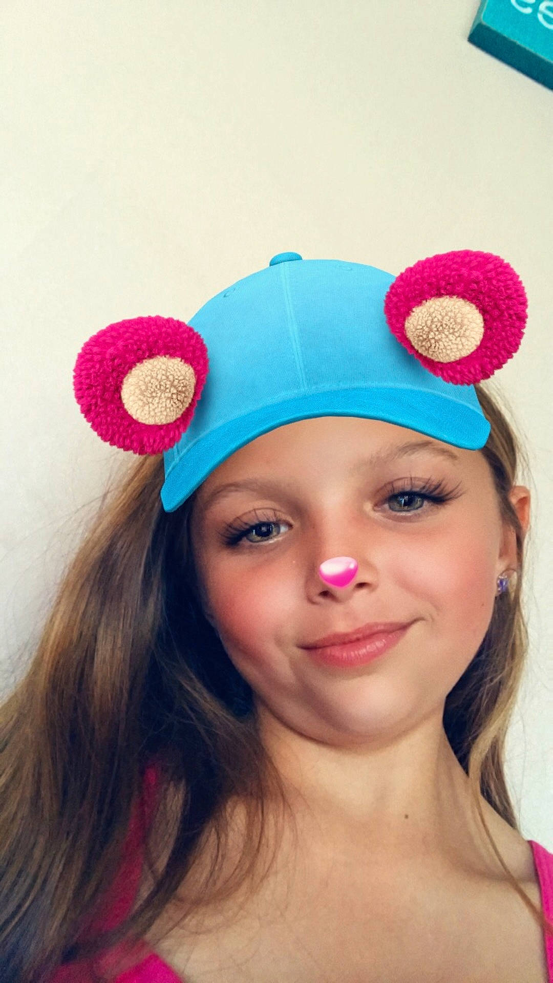 Liberty is registered to the contest to win money with this photo: beanie, cap, crochet, ear, fashion_accessory, girl, hair_accessory, hat, headband, headgear, knit_cap, magenta, party_hat, person, pink, sun_hat