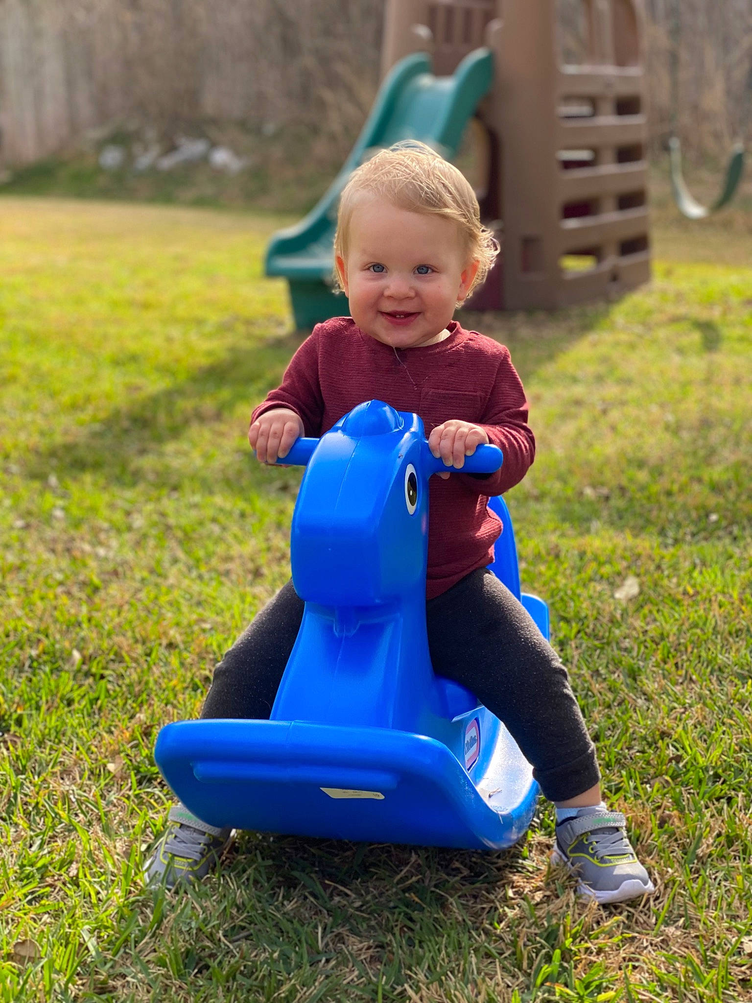 Asher Lang is registered to the contest to win money with this photo: baby, baby_toddler_clothing, child, city, dress, electric_blue, fun, grass, happy, joy, lawn, leisure, outdoor_play_equipment, people_in_nature, person, plant, playground, public_space, recreation, riding_toy