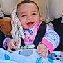 baby, infant, smiling, car_seat, blanket, plush_toy, clothing, happy, cute, child, face, hand, pink, blue, pattern, animal_print, seatbelt, indoors, portrait, toddler