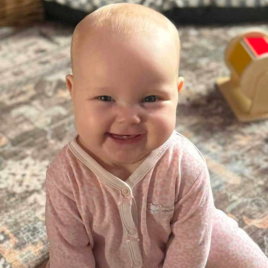 Ivy joined the competition — help win amazing prizes! accessories, baby, babycrawling, babylaughing, blonde, box, clothing, crawling, face, hair, happy, head, laughing, newborn, pants, person, photography, portrait, sitting, smile