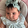 Aitana is registered to the contest to win money with this photo: baby, infant, child, headband, bow, cushion, pink, mint_green, checkered_clothing, soft_texture, cute, chubby_cheeks, portrait, indoors, closeup, relaxed, adorable, small_earring, person, sleepy