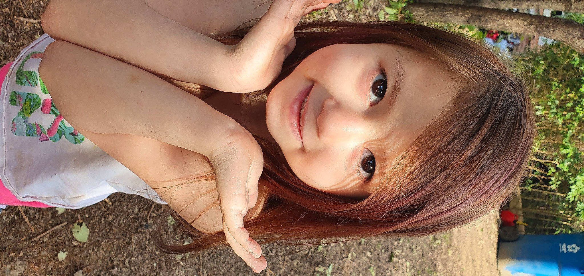 Gabriella is registered to the contest to win money with this photo: eye, eyebrow, eyelash, face, flash_photography, hair, hand, head, human_body, jaw, joy, lip, mouth, neck, nose, people_in_nature, person, plant, skin, smile