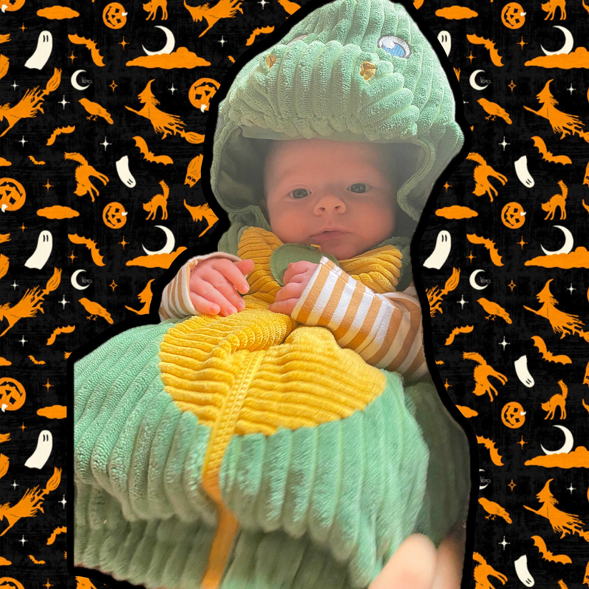 Theo joined the competition — help win amazing prizes! baby, child, costume, dinosaur, halloween, holiday, cute, infant, face, hands, hood, green, yellow, pattern, background, ghost, bat, pumpkin, spooky, festive