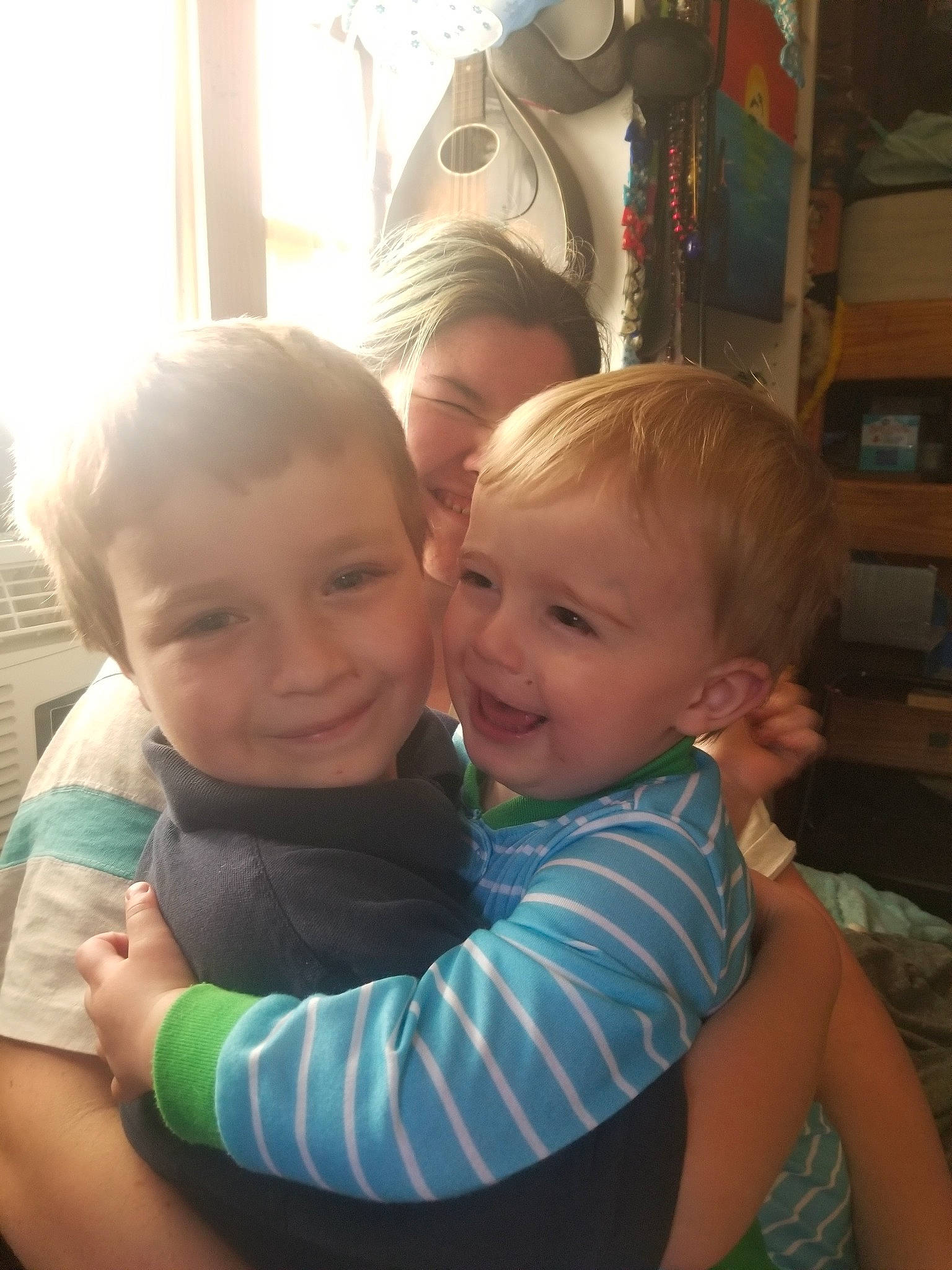 Tidus joined the competition — help win amazing prizes! arm, baby, cheek, child, daughter, ear, eye, face, fun, happy, head, hug, interaction, iris, joy, mother, people, person, sibling, skin