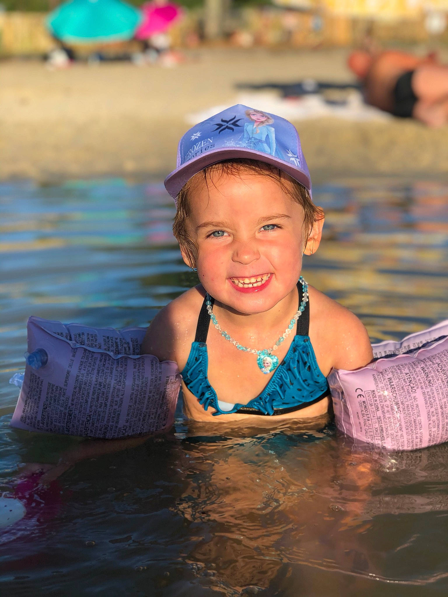 Mya participe au concours pour gagner de l'argent avec cette photo : child, fun, headgear, headwear, joy, leisure, nose, person, play, summer, toddler, vacation