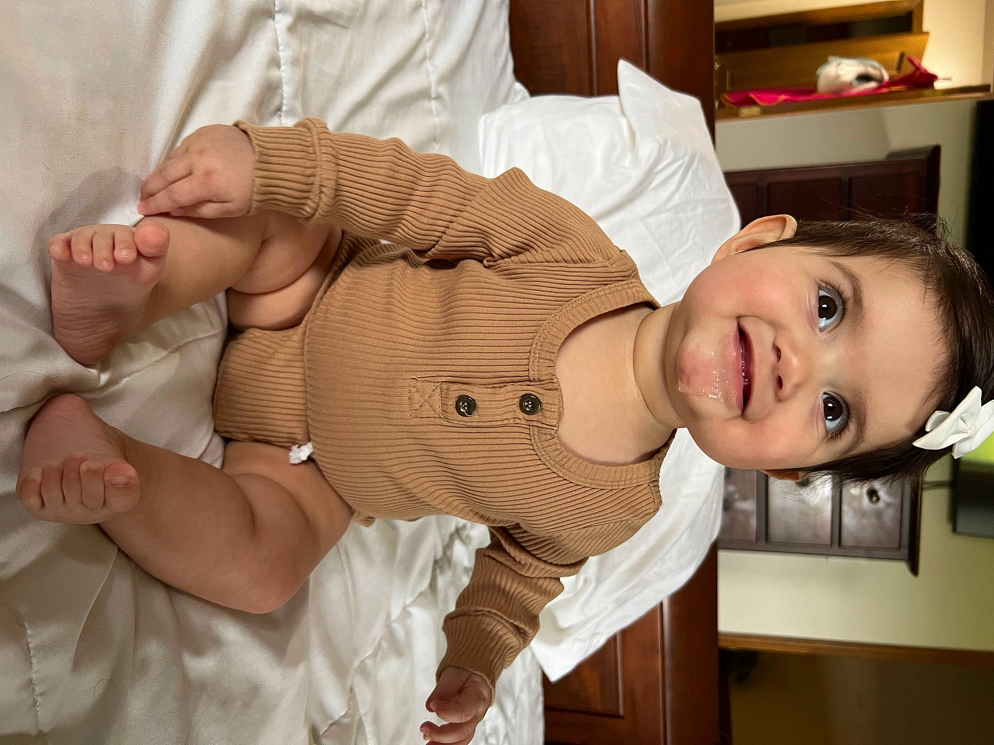 Harmony is registered to the contest to win money with this photo: abdomen, baby, baby_toddler_clothing, child, comfort, facial_expression, finger, gesture, happy, head, joy, leg, person, skin, sleeve, smile, thigh, thumb, toddler, trunk