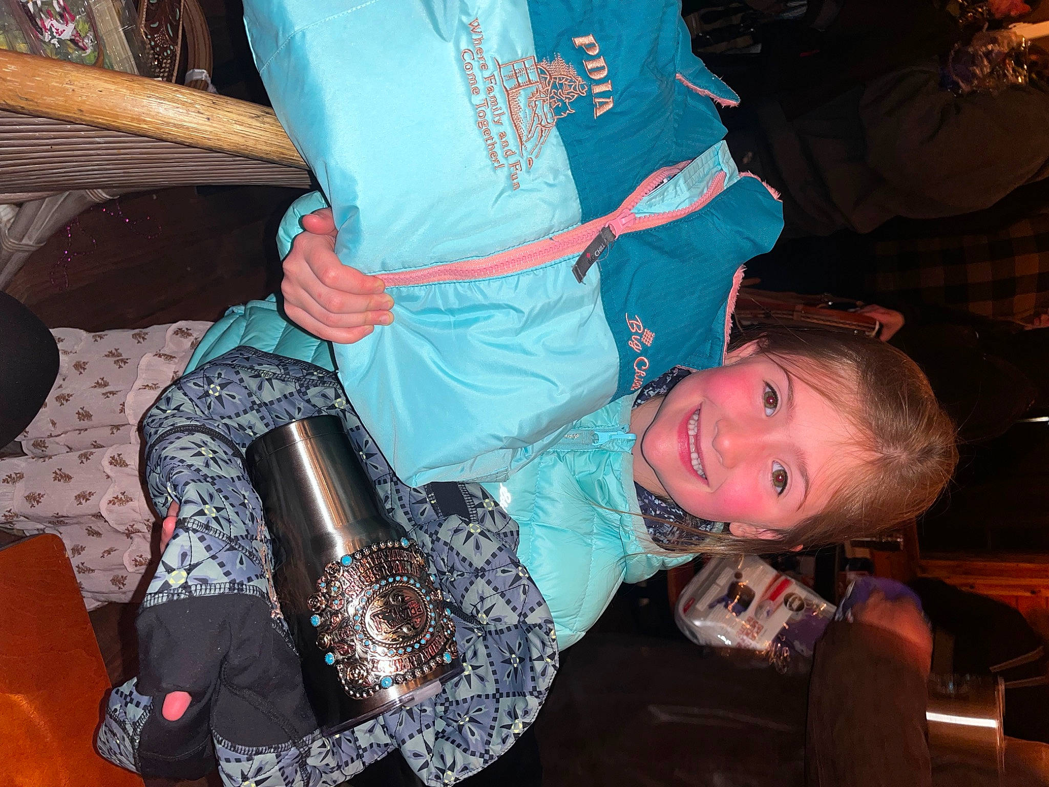 Gracee Kenzlee joined the competition — help win amazing prizes! alcohol, bag, bottle, drink, event, fashion_accessory, fun, human_body, human_leg, joy, lap, luggage_and_bags, nail, pattern, person, room, sitting, smile, thigh, tree