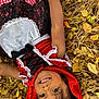 Kehlani joined the competition — help win amazing prizes! child, smiling, costume, red_hood, autumn_leaves, fall, outdoor, nature, portrait, happy, face, grass, seasonal, playful, young_child, cute, headwear, dress, black_hair, daylight