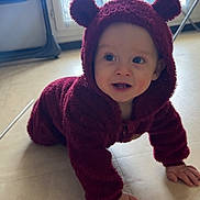 Hayden a rejoint le concours — aidez-le/la à gagner de superbes lots ! baby, child, crawling, hoodie, maroon, indoor, floor, window, light, curious, smile, hand, face, person, infant, cute, clothing, young, warm, cozy