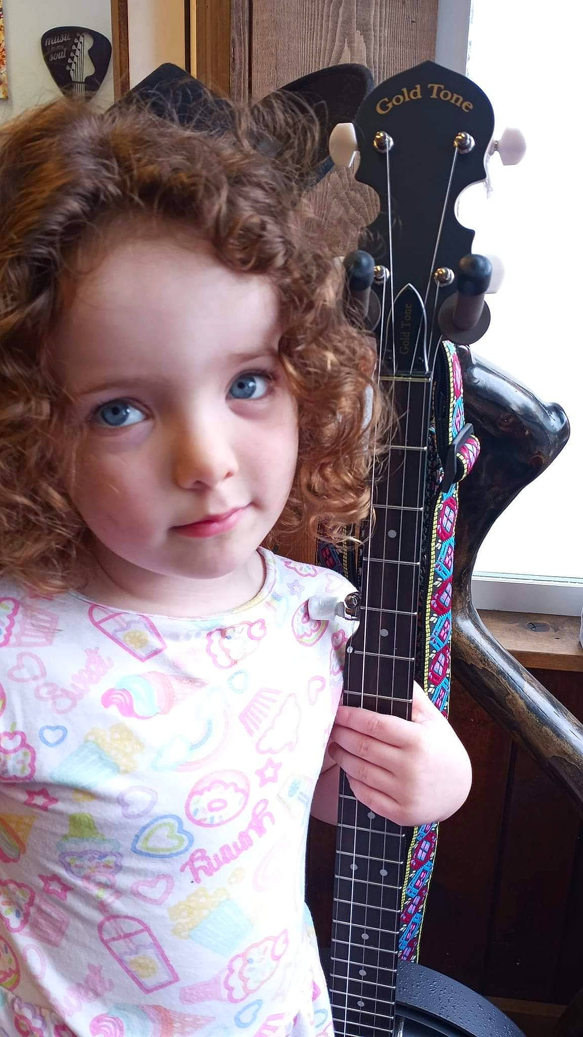 Elyzabeth joined the competition — help win amazing prizes! chin, cool, eye, eyebrow, eyelash, face, guitar, guitar_accessory, hairstyle, human, iris, lip, long_hair, musical_instrument, nose, person, plucked_string_instruments, skin, string_instrument, string_instrument_accessory