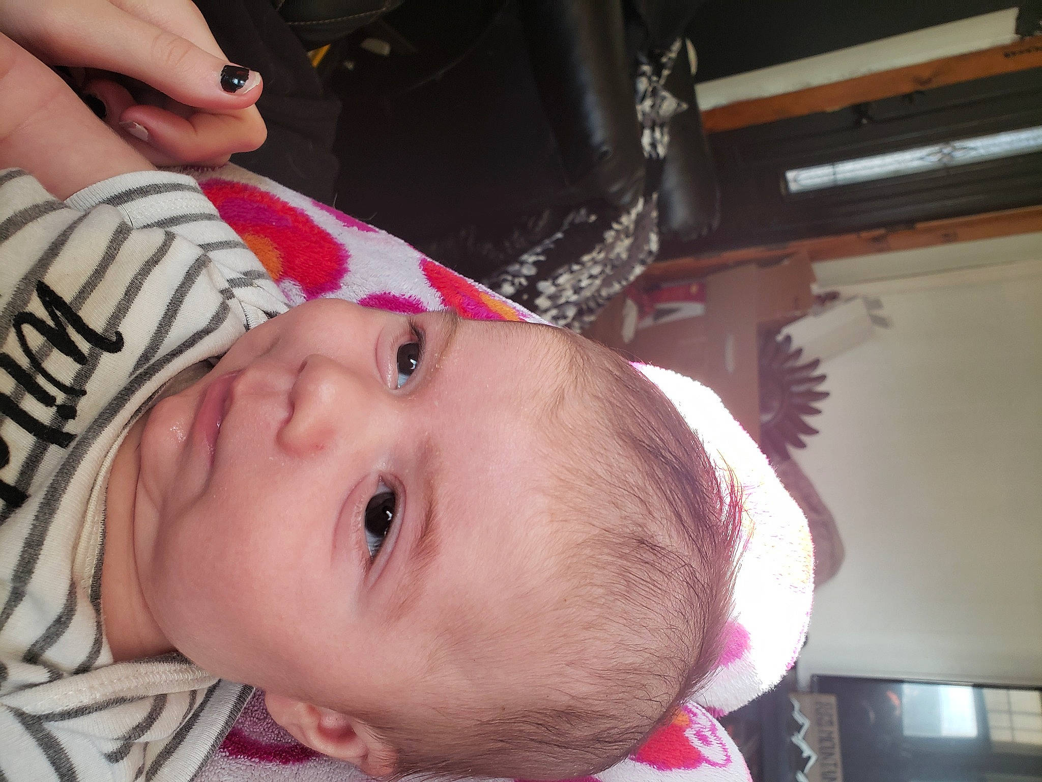 Creed is registered to the contest to win money with this photo: baby, baby_toddler_clothing, cheek, chest, child, chin, elbow, eyelash, eyewear, finger, fun, hairstyle, hat, lip, mouth, nose, person, room, skin, toddler