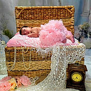 Riley joined the competition — help win amazing prizes! baby, sleeping, pink_tutu, woven_basket, lace, pearls, flowers, antique_clock, soft_lighting, nursery, decor, portrait, child, peaceful, indoors, cute, resting, delicate, fabric, still_life