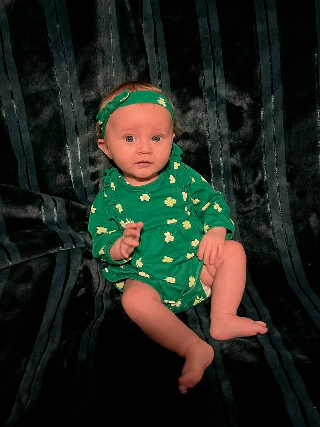 Haizley is registered to the contest to win money with this photo: baby, baby_toddler_clothing, cap, child, costume, curtain, darkness, fashion_design, flash_photography, foot, fun, grass, magenta, pattern, person, personal_protective_equipment, portrait_photography, sitting, sleeve, toddler