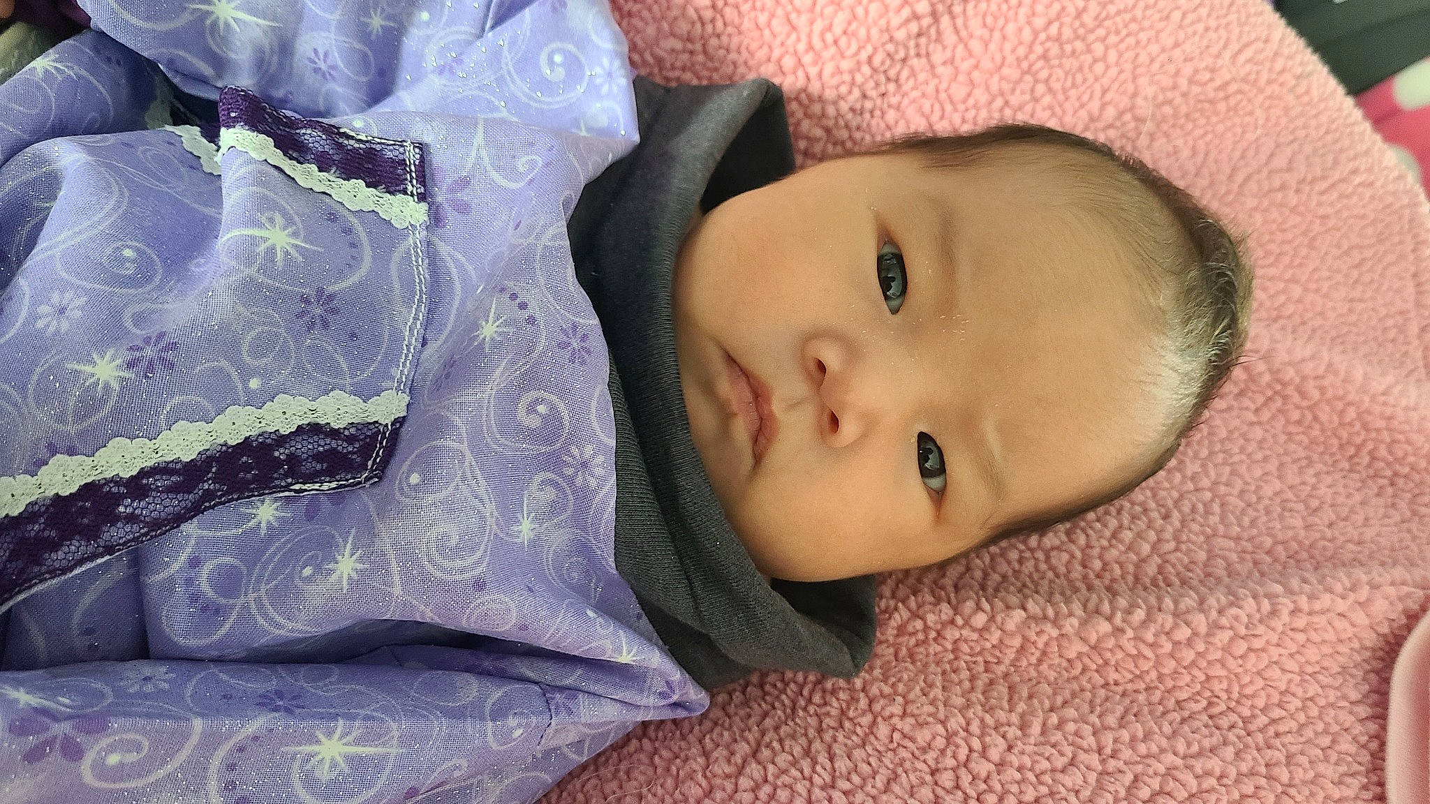 Kristina is registered to the contest to win money with this photo: baby, baby_toddler_clothing, cheek, child, comfort, fashion_accessory, fur, grass, hat, human_body, linens, nose, pattern, person, portrait_photography, sleeve, textile, toddler, wood