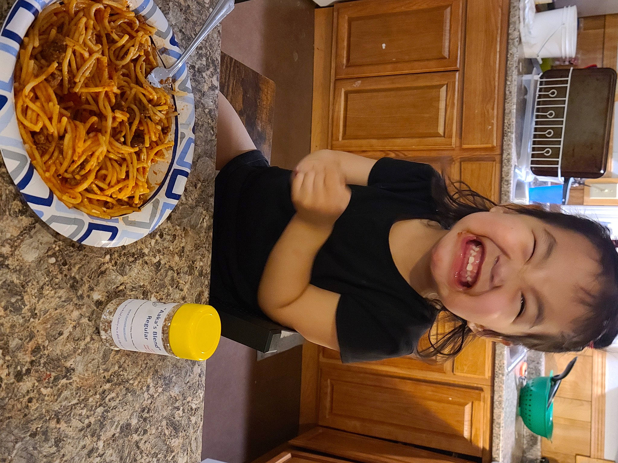 Karena is registered to the contest to win money with this photo: comfort_food, cuisine, dish, food, french_fries, fun, happy, home_appliance, ingredient, junk_food, noodle, pasta, person, refrigerator, rice_noodles, smile, staple_food, t_shirt, tableware, wood