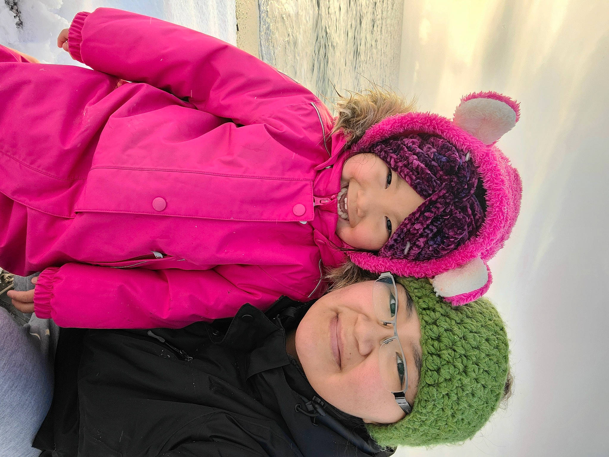 Karena is registered to the contest to win money with this photo: child, clothing, comfort, event, face, fun, fur, happy, headwear, jacket, joy, leisure, magenta, organ, outerwear, person, pink, plant, purple, smile