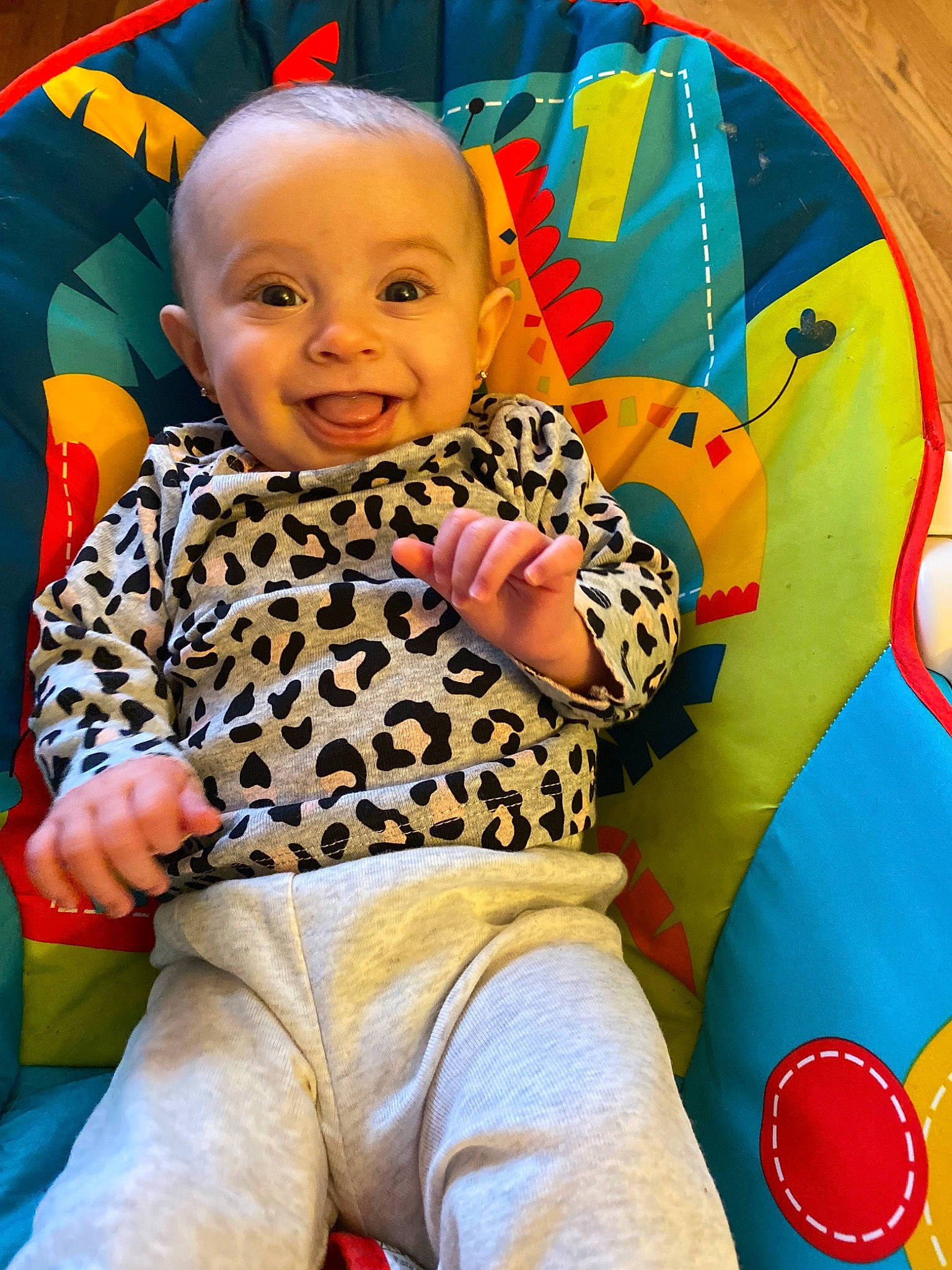 Hazel Grace is registered to the contest to win money with this photo: baby, baby_products, baby_toys, cheek, child, eye, head, joy, nose, person, play, product, sitting, skin, smile, textile, toddler, toy, yellow