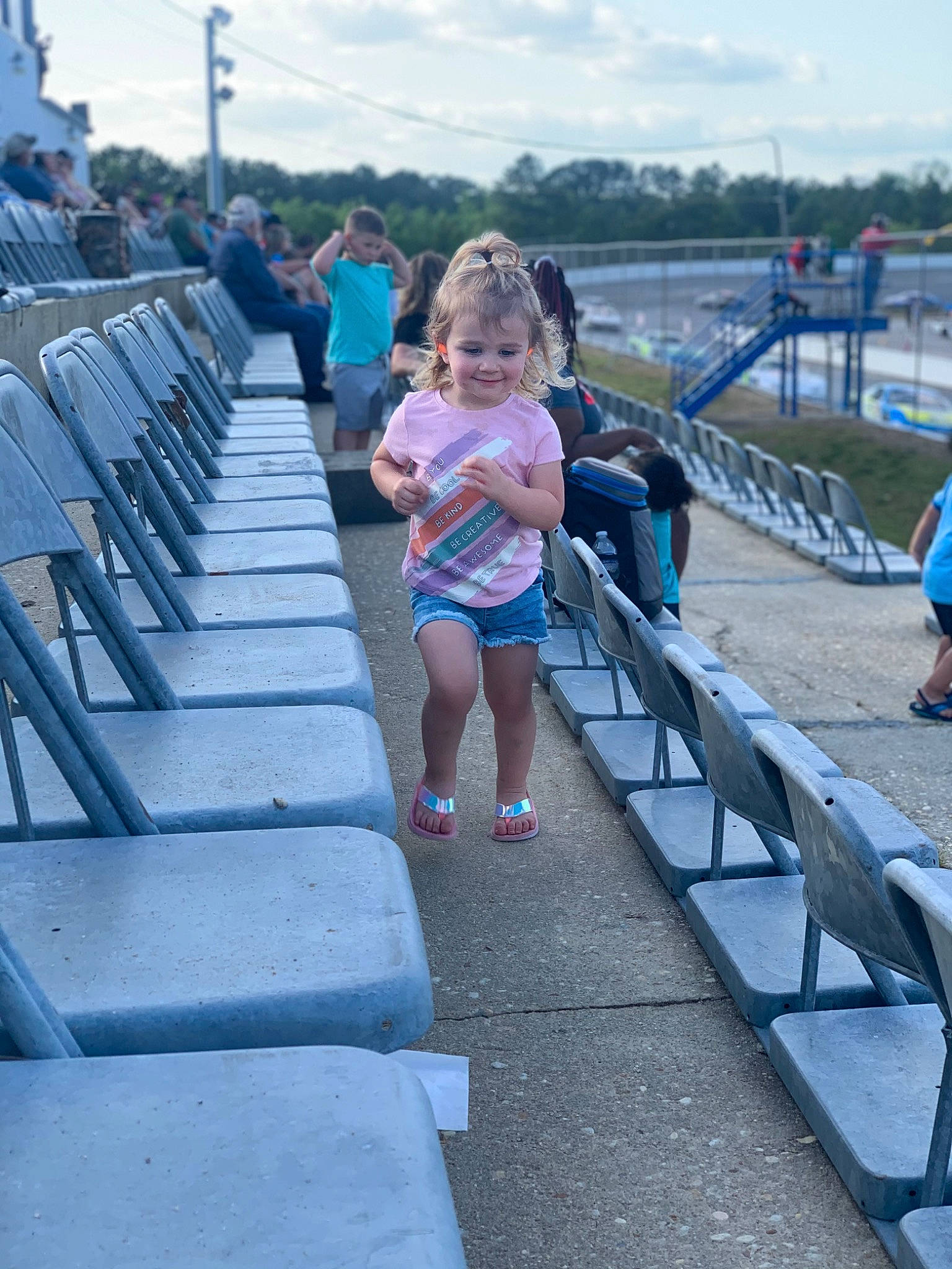 Aubree joined the competition — help win amazing prizes! bridge, child, city, cloud, electric_blue, fun, handrail, happy, human_leg, joy, leisure, nonbuilding_structure, pedestrian, person, recreation, sky, spring, t_shirt, toddler, travel