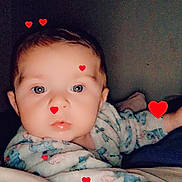 Lyna a rejoint le concours — aidez-le/la à gagner de superbes lots ! adorable, baby, baby_girl_or_boy, child, closeup, cute, expressionless, face, head, heart_graphics, indoors, infant, lying_down, pajamas, person, portrait, skin, sleepwear, soft_lighting, young_child