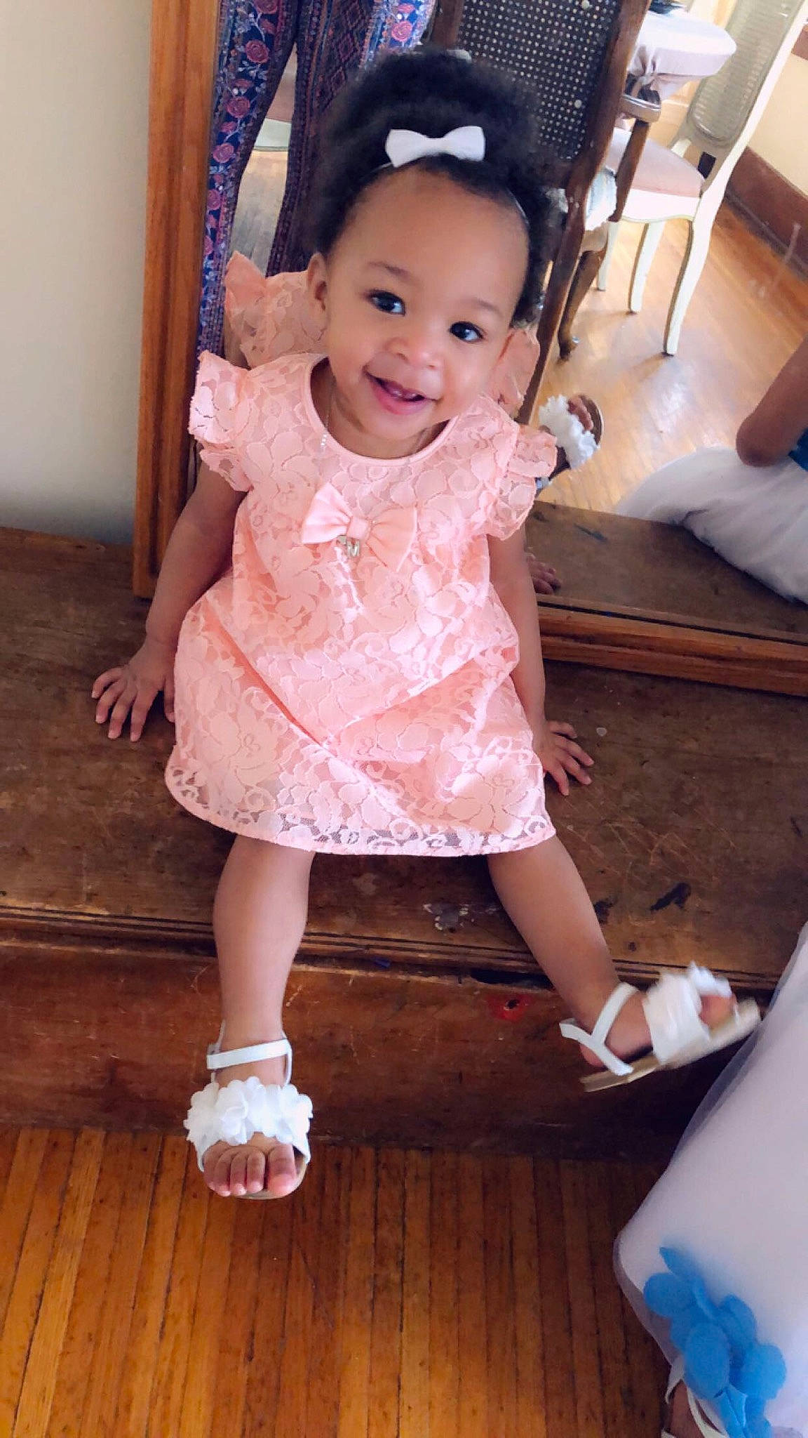 Melia is registered to the contest to win money with this photo: baby, cheek, child, child_model, dress, leg, person, pink, shoe, skin, smile, toddler
