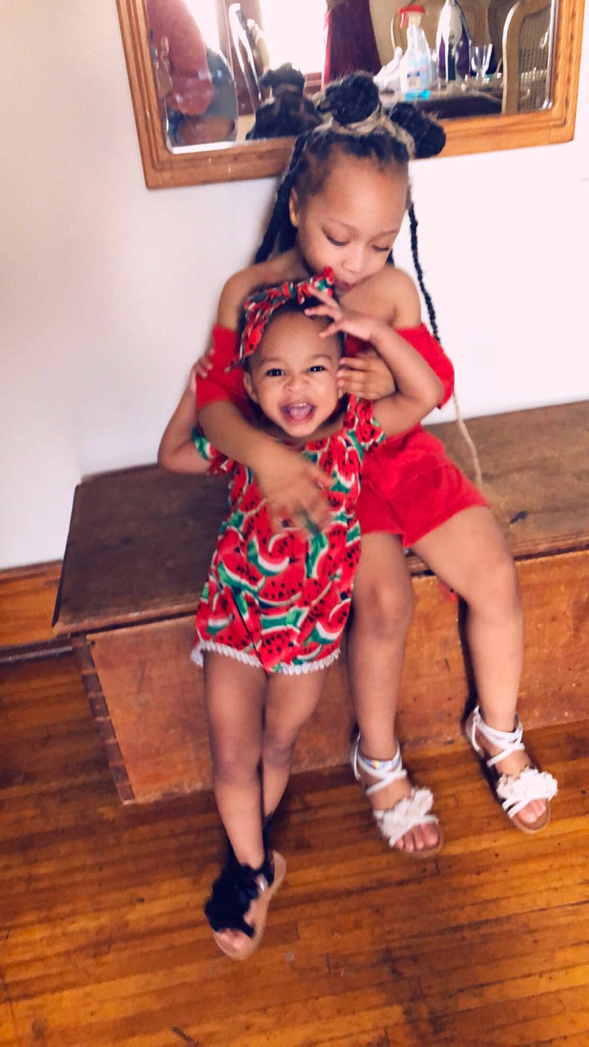 Melia is registered to the contest to win money with this photo: child, child_model, daughter, floor, flooring, footwear, fun, happy, hardwood, joy, leg, person, play, shoe, shoulder, smile, t_shirt, toddler, vacation, wood