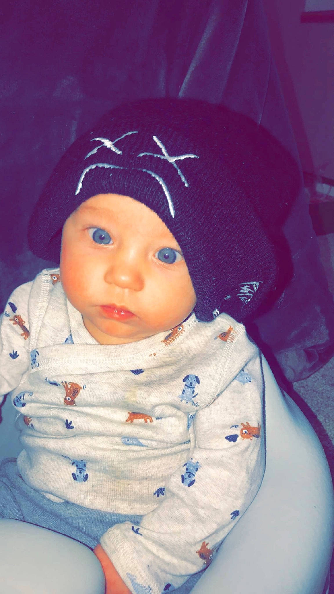 Liam is registered to the contest to win money with this photo: baby_toddler_clothing, cap, cheek, chin, cool, doll, electric_blue, eye, eyebrow, eyelash, face, head, headgear, headwear, iris, knit_cap, lip, nose, outerwear, person