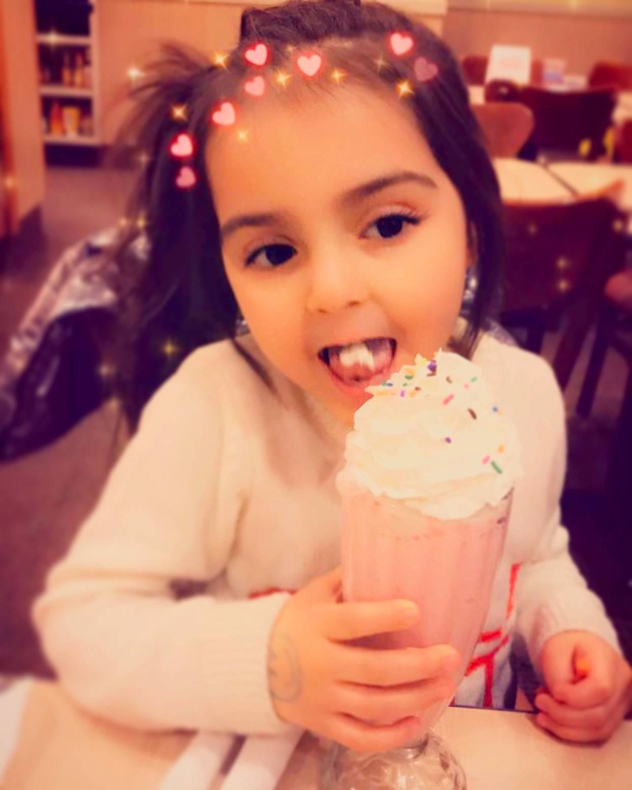 Estephania is registered to the contest to win money with this photo: baby, beauty, birthday, child, cream, dairy, dessert, drink, eating, face, food, frozen_dessert, happy, ice_cream, joy, milkshake, party, person, smile, smoothie