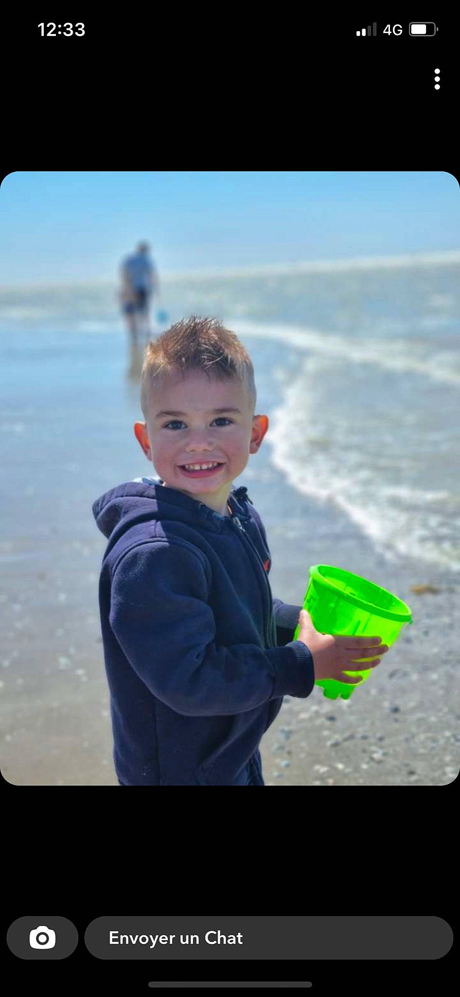 Sacha participe au concours pour gagner de l'argent avec cette photo : azure, body_of_water, child, electric_blue, fun, gesture, happy, horizon, joy, leisure, ocean, people_in_nature, person, recreation, sitting, sky, sleeve, smile, toddler, travel