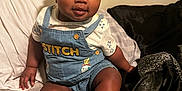 Zanai is registered to the contest to win money with this photo: baby, child, infant, headband, bow, socks, denim_overalls, stitch, sitting, indoor, blanket, fabric, cute, portrait, smile, skin, face, person, clothing, young
