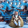 Javan Mccormick is registered to the contest to win money with this photo: airplanes, baby, background, beanbag, blue_sky, cartoon, child, child_portrait, clothing, clouds, cute, decor, expression, indoor, infant, portrait, seated, socks, soft_toys, vintage_airplane
