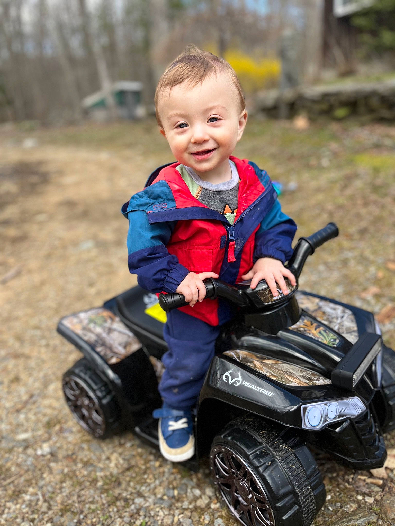 Frankie joined the competition — help win amazing prizes! automotive_tire, baby, baby_toddler_clothing, electric_blue, face, fun, grass, joy, motor_vehicle, person, recreation, riding_toy, rolling, smile, tire, toddler, toy, tread, tree, vehicle