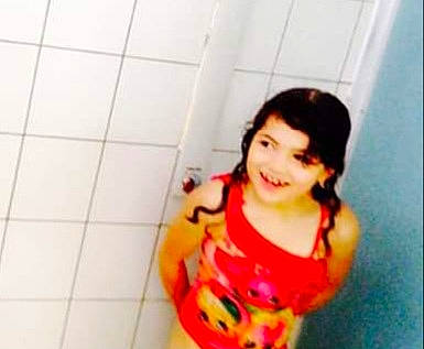 Alexia joined the competition — help win amazing prizes! arm, bathroom, black_hair, cheek, child, elbow, flooring, fun, happy, joy, leisure, mouth, nose, pattern, person, room, sitting, sleeve, smile, thigh