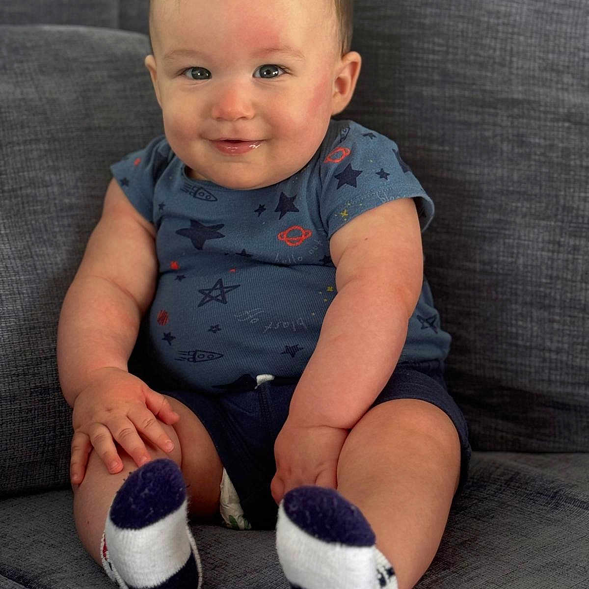 Lucas William joined the competition — help win amazing prizes! baby, clothing, couch, cushion, face, footwear, furniture, happy, head, homedecor, hosiery, pants, person, photography, portrait, shoe, shorts, sitting, sleeve, sock