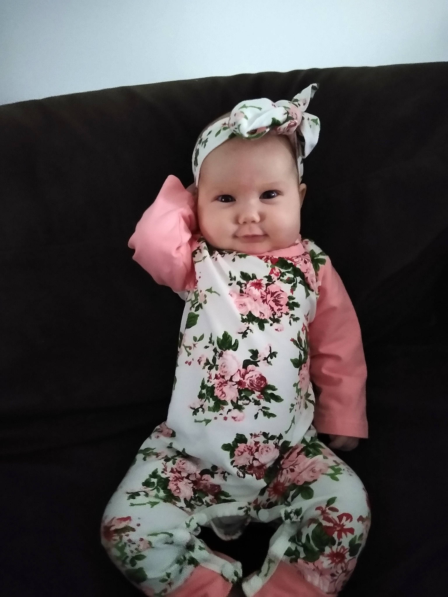 Josephine is registered to the contest to win money with this photo: baby, baby_products, baby_toddler_clothing, cheek, child, fashion_accessory, hair_accessory, head, headband, headgear, headpiece, pattern, person, photography, pink, sitting, skin, sleeve, smile, toddler