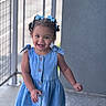 Alaïa joined the competition — help win amazing prizes! balcony, blue, bracelet, child, clothing, concrete_floor, curly_hair, cute, daylight, denim_dress, girl, hair_bows, happy, outdoor, person, portrait, railing, smiling, toddler, walking
