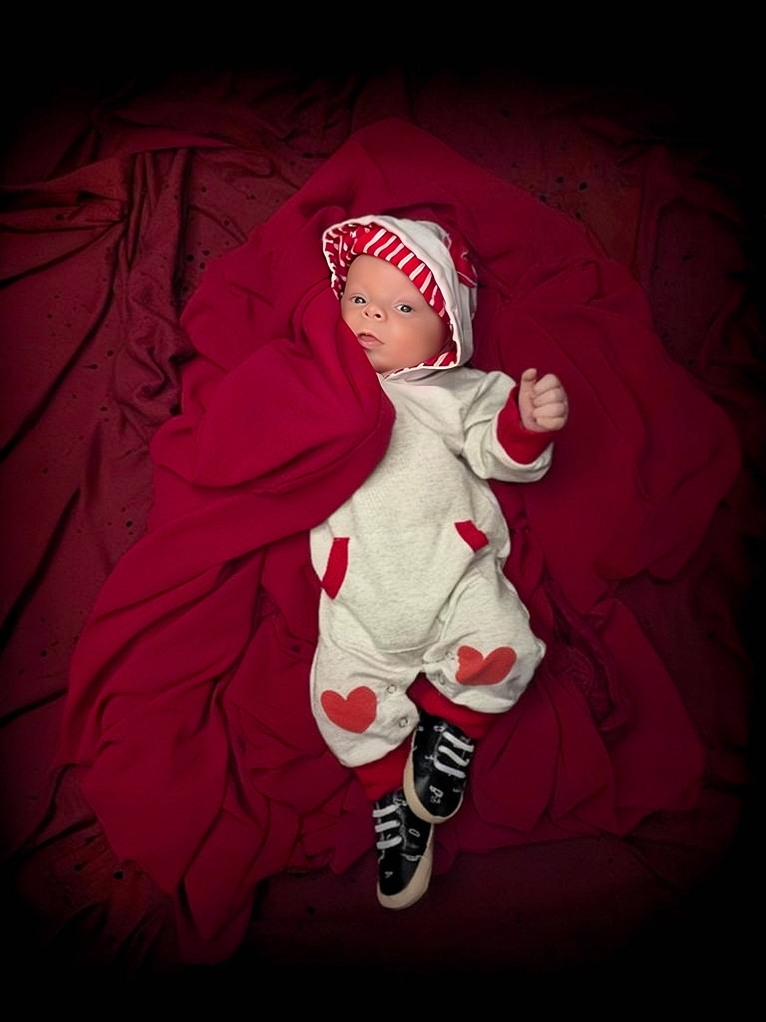 Izzy is registered to the contest to win money with this photo: art, baby, baby_toddler_clothing, cap, carmine, event, fictional_character, flash_photography, font, gesture, graphics, happy, hat, headwear, magenta, pattern, person, pink, santa_claus, sleeve